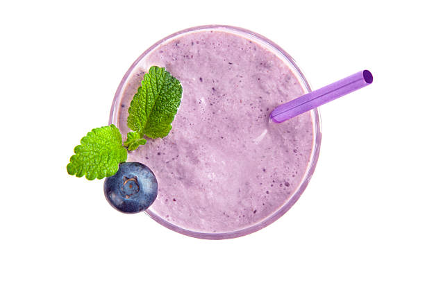 istock Fresh blueberry smoothie isolated on white background 2238566621
