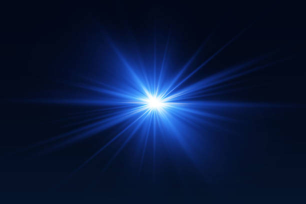 istock Blue glowing glare of a star. On a dark background. 2238567874