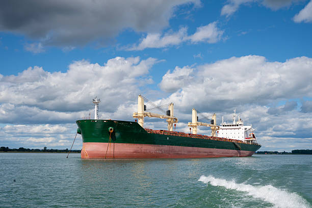 istock Bulk carrier with cranes navigating the St. Lawrence Seaway 2238569399