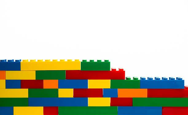 istock Build a wall with toy blocks 2238569517