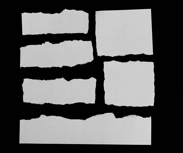 istock Collect white paper sheets on black background 2238569681