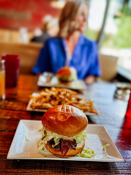 Gourmet Double Cheeseburger with Crispy Bacon and Golden Fries
