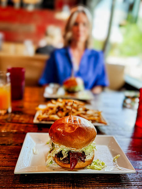 Juicy Gourmet Burger with Fresh Toppings at Classic American Burger Joint