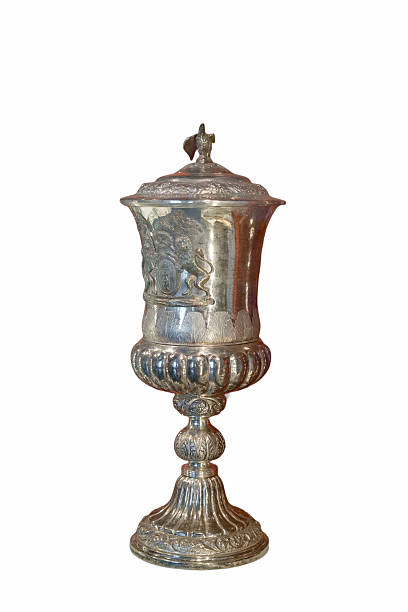 istock Ornate silver trophy with intricate details displayed on a plain background 2238581322