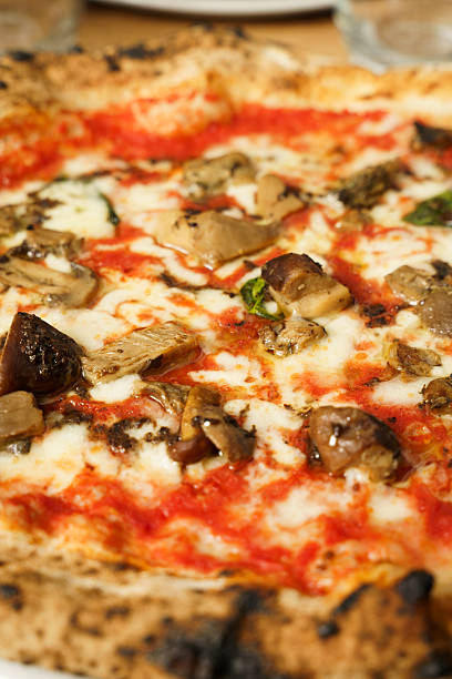 Neapolitan pizza with porcini mushrooms and mozzarella