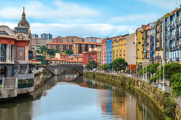 istock Bilbao Spain Colorful Waterfront with Ribera Market, River Reflections and Bridge. 2238584547