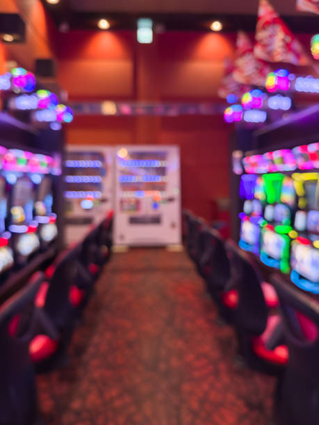istock Defocused Pachinko Parlor Background、Abstract Neon Slot Machine Lights 2238585795