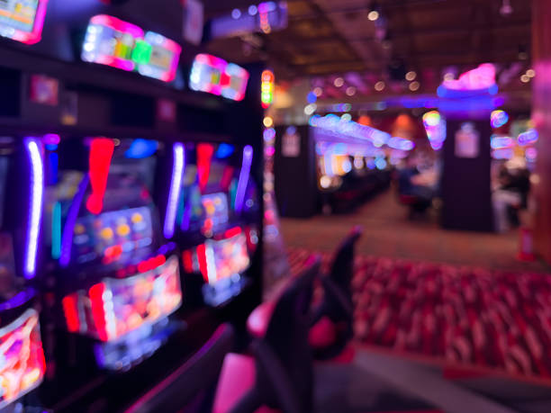 istock Defocused Pachinko Parlor Background、Abstract Neon Slot Machine Lights 2238585810
