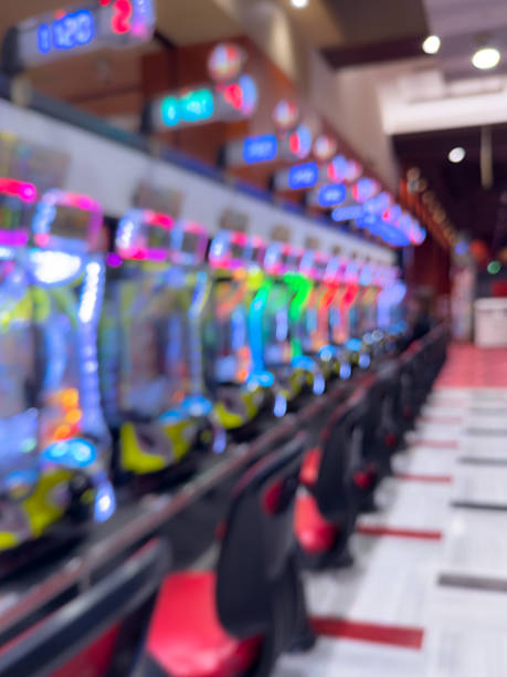 istock Defocused Pachinko Parlor Background、Abstract Neon Slot Machine Lights 2238585939