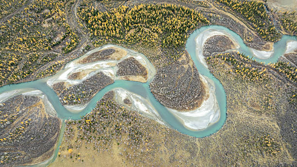 istock autumn landscape from above, with a winding turquoise mountain r 2238587575