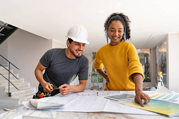 istock Interior designer showing a building contractor a color for the walls 2238588168