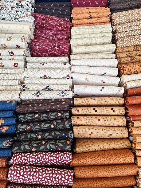 istock Colorful fabric bundles showing quilting patterns and textiles 2238589752