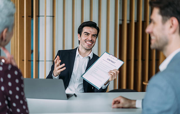 istock Business people signing a contract in the office. 2238591381