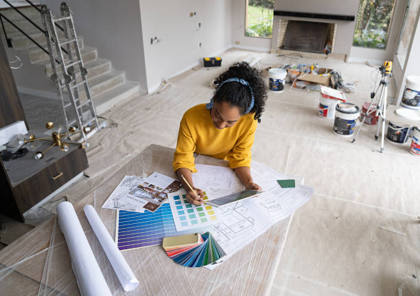 istock Interior designer drawing a sketch while renovating a house 2238592428