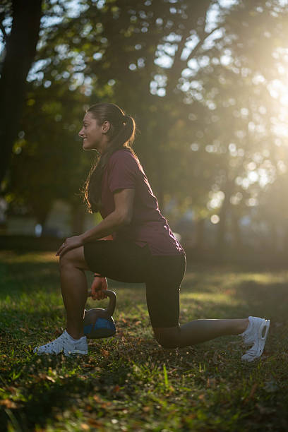 istock Fit sportswoman exercising with kettle bell 2238596534