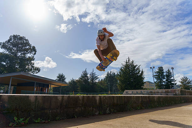 istock Skater performing trick in air at skatepark 2238600264