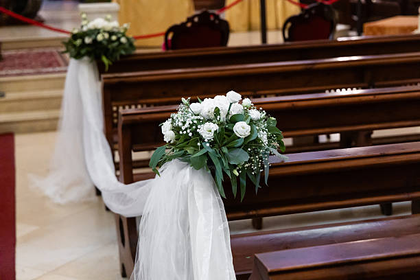 istock Wedding decorations with white ribbons and flowers 2238601240