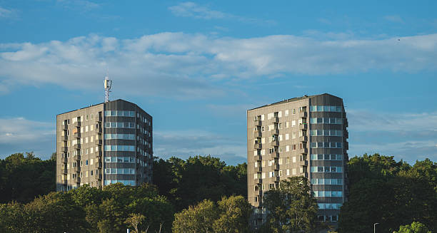 istock Twin residential towers against blue cloudy sky.. 2238606748