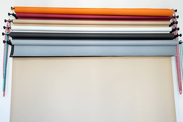 Close-up of Photography Studio Backdrop Rolls and Holders