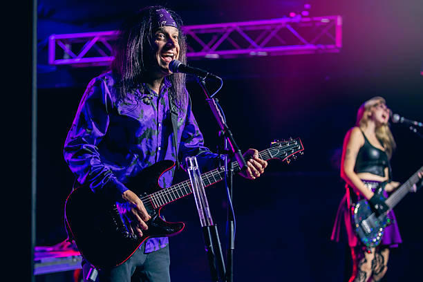 istock Rock Band on Stage Performing Live Concert 2238621427