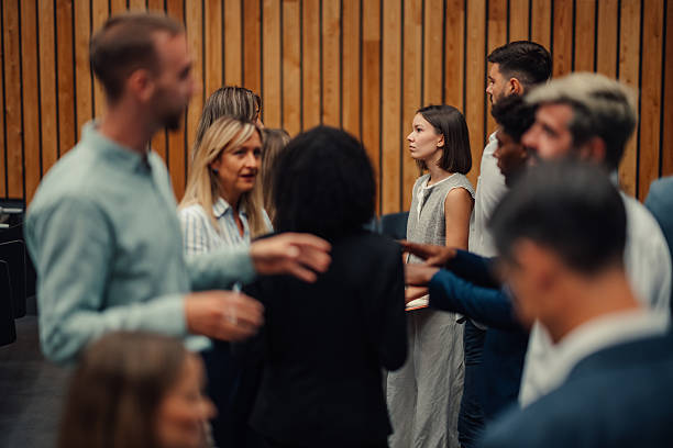 istock Professionals networking at business conference event 2238623619