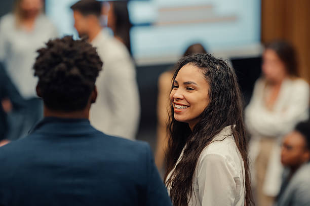 istock Diverse business professionals networking at corporate conference 2238624535
