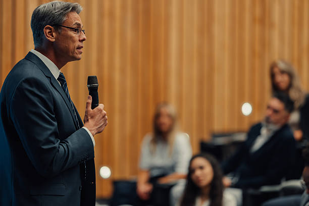 istock Professional speaker addressing audience during business conference 2238624747