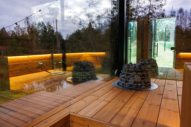 istock Modern Sauna Interior with Wooden Paneling and Central Heater 2238630794