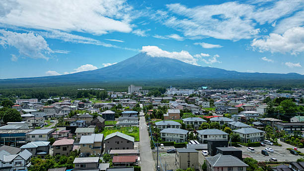 istock Mount Fuji behind a Japanese village, seen from above 2238632637