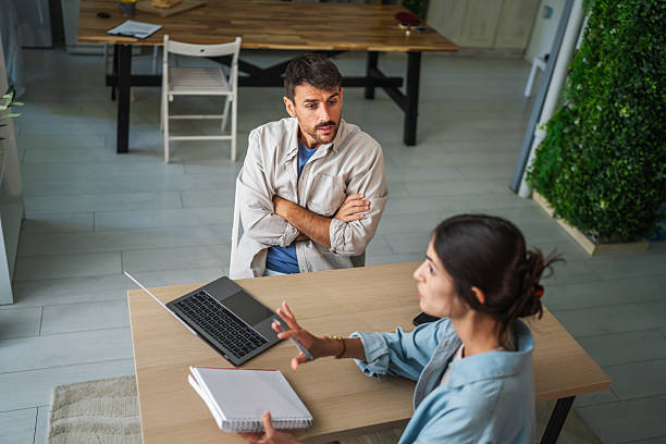 istock Colleagues having a serious discussion or disagreement in office 2238639677