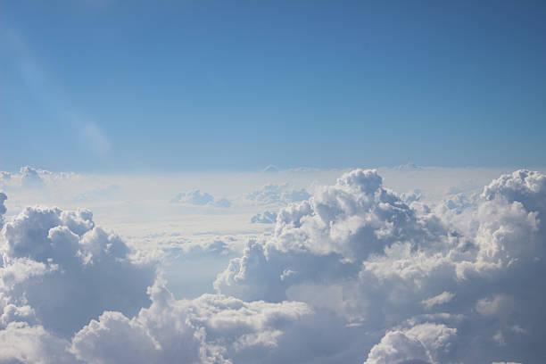 istock Clouds Above the World, View from an Airplane 2238643766
