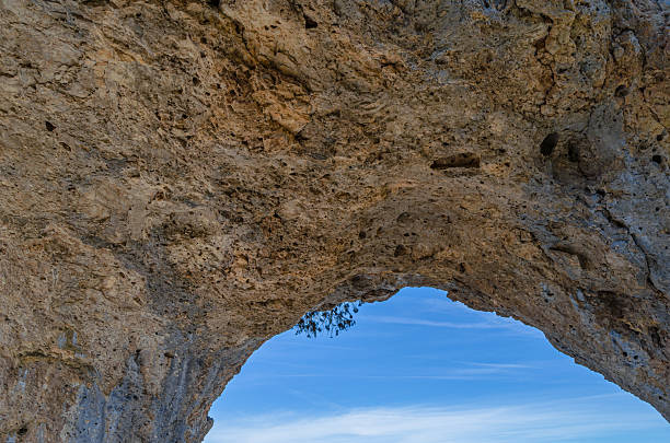 Devil's Window (Spanish: Ventano del Diablo), an example of karst erosion on limestone rock in the Serrania de Cuenca Natural Park, Castilla la Mancha, Spain