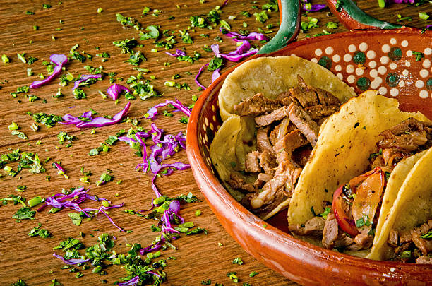 Authentic Mexican Grilled Steak Tacos (Tacos de Bistec) in a Clay Cazuela