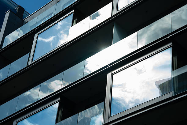 istock Modern Glass Apartment Building With Reflections 2238647196
