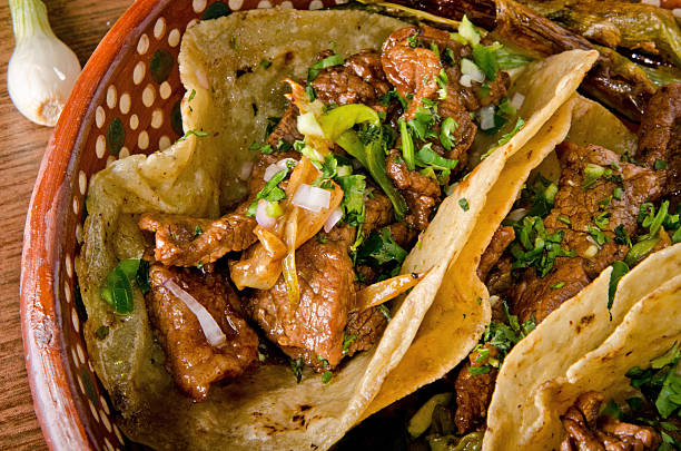 Authentic Mexican Barbacoa Tacos with Fresh Onion and Cilantro