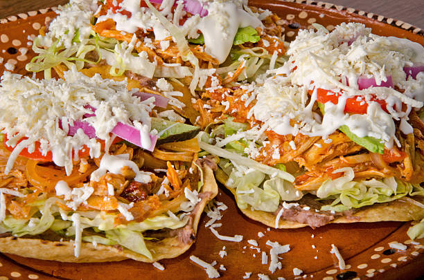 istock Authentic Mexican Chicken Tinga Tostadas with Cream and Fresh Cheese 2238649170