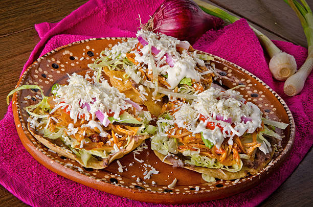 istock Authentic Mexican Chicken Tinga Tostadas with Cream and Fresh Cheese 2238649206