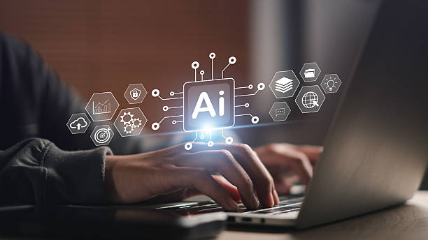 istock Hands typing on laptop with AI digital interface icons, representing AI business tools, automation software, machine learning analytics, and smart technology solutions for modern enterprises. 2238652788