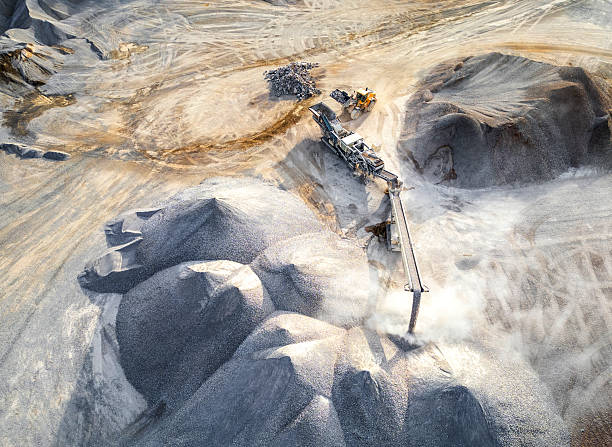 istock Aerial View of Industrial Quarry Site with Geometric Patterns and Textured Terrain 2238653280