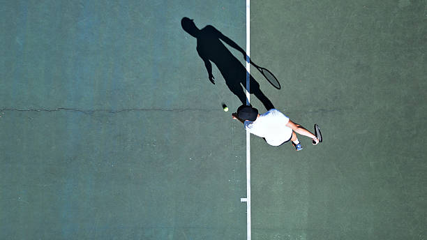 istock Tennis Player Practicing Overhead Shot on Hardcourt 2238654051