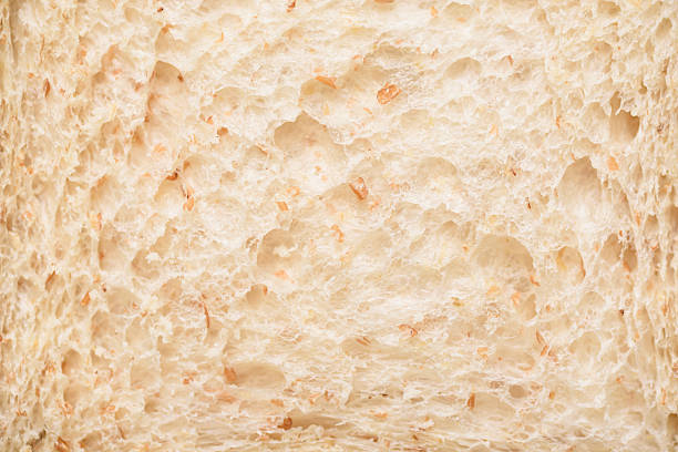 Close-up detail of whole wheat bread slices texture background