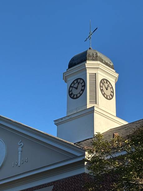 istock Clock tower on a roof in the evening sunlight. 2238660190