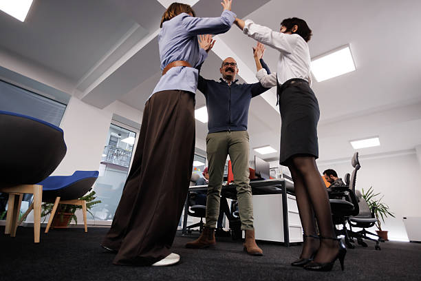 istock Business team engages in a dynamic brainstorming session in a modern office space during working hours to foster creativity and collaboration 2238664253