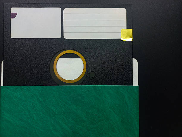istock 5.25 inch floppy disk in black a retro storage unit. 2238664942