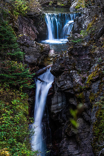istock Cascading Waterfall in Glacier National Park 2238665207
