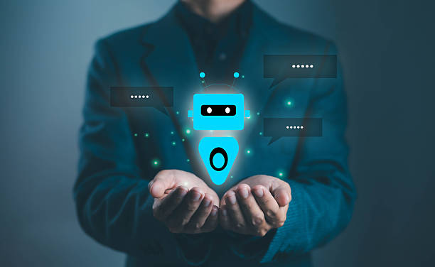 istock Businessman holding digital chatbot hologram with AI technology, virtual assistant, and customer support concept for innovation, automation, and future communication service. 2238667401
