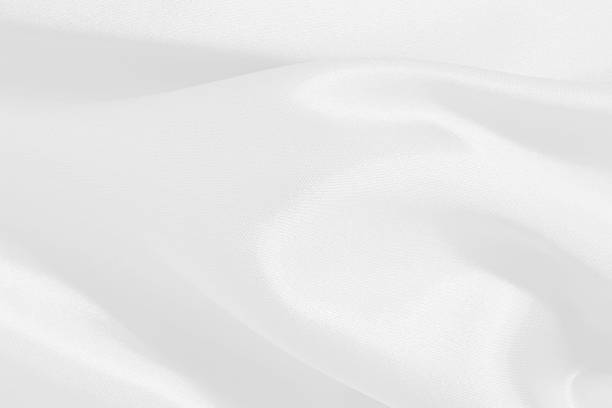 istock White fabric texture for background and design, beautiful pattern of silk or linen. 2238671298