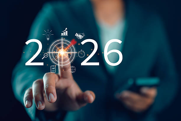 istock Positive indicators in 2026, Businessman touching target icon on virtual screen with 2026. Startup business 2026. Merry Christmas and happy new year concept. Idea and inspirations in new years 2026. 2238671514