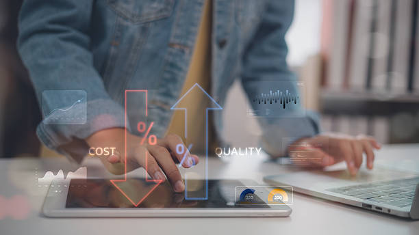 istock Person analyzing digital graphs on tablet showing cost reduction and quality improvement, representing business efficiency, strategic management, productivity, and performance optimization. 2238679621