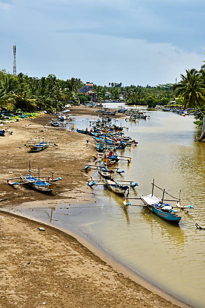 istock Coastal scene and local boats on the island of Java 2238679891